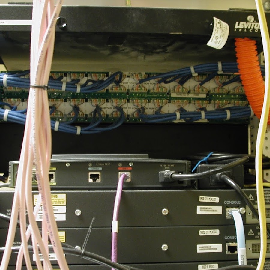 The back of a network wiring rack